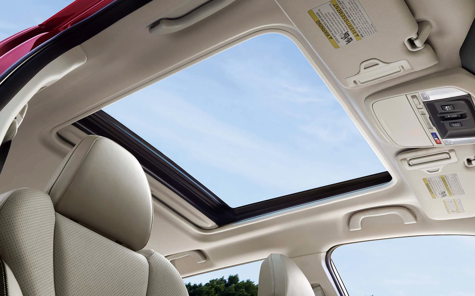 A view through the power sliding panoramic moonroof on the 2022 Forester Sport. | Subaru Superstore of Surprise in Surprise AZ
