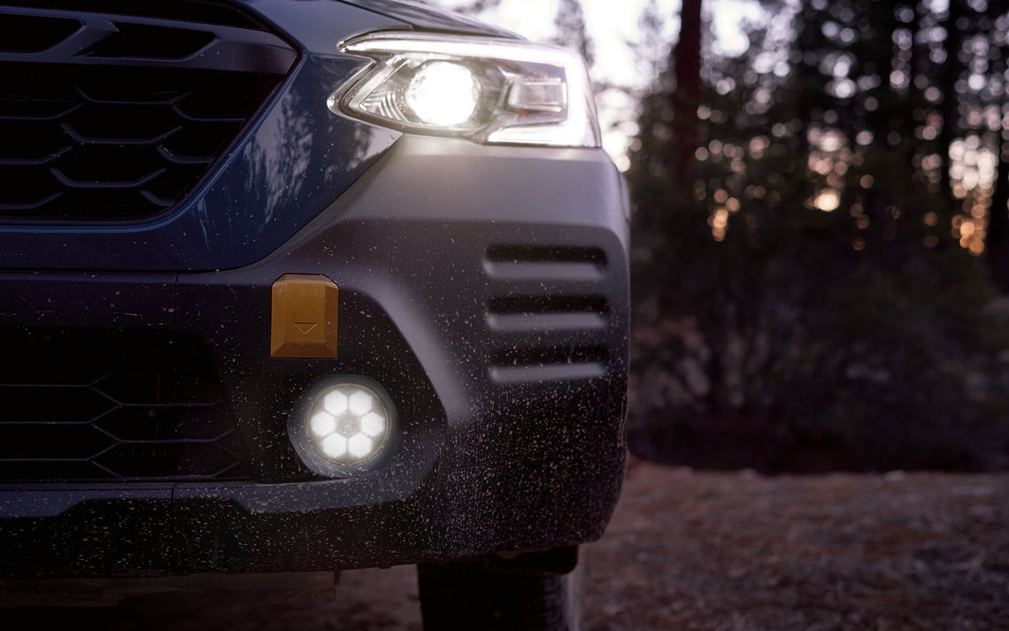 The front of a Subaru Outback Wlderness focussing on the lights